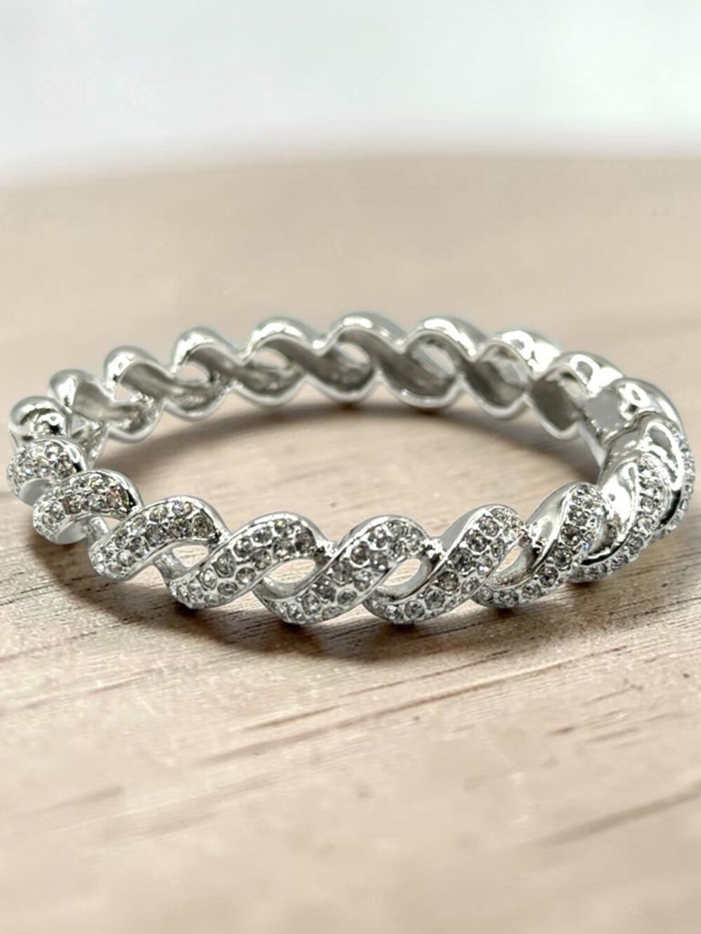 Silver-Tone Twist Hinged Bangle Bracelet with Rhinestone Accents